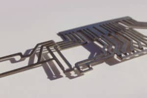 Stamping of a Brass Palladium Plated Leadframe Insert for the Automotive Industry 