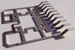 Stamping of Aluminum Inlaid Copper Leadframe for the Automotive Industry 